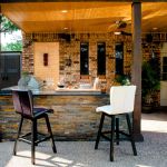 New and modern outdoor kitchen on a sunny summer evening, dinner preparation