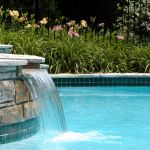 Beautifully landscaped pool with water feature