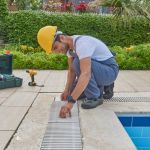 Pool grid and grill repair style with repairman.